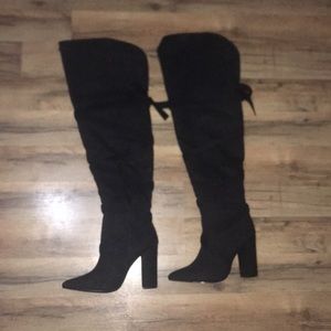 Black thigh high boots